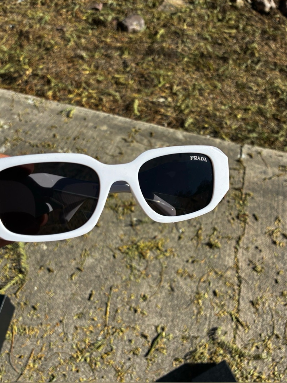 Prada White Frame Sunglasses with Black Lenses